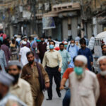 masked people in public – market – Pakistan